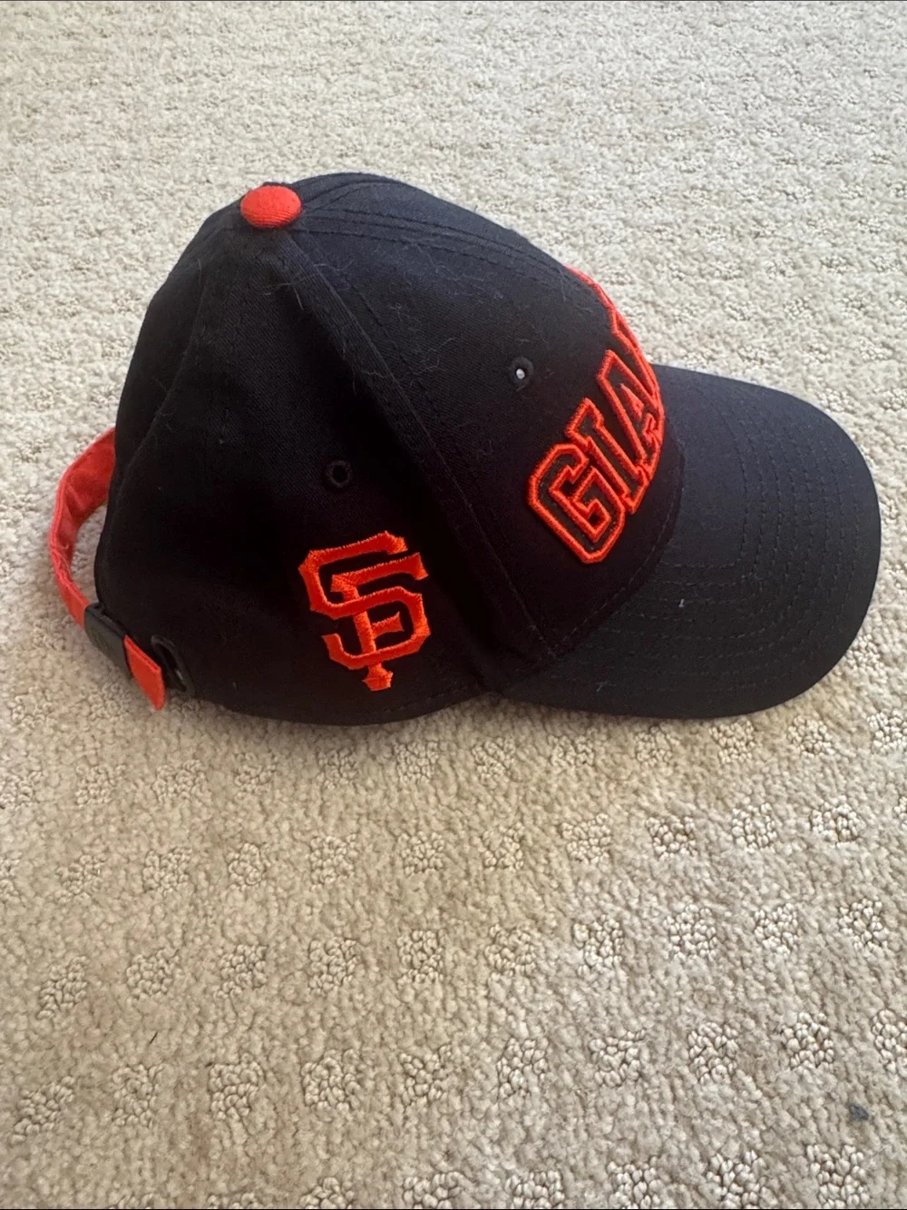 GIANTS Embroidered Black Baseball Cap with Orange Accents